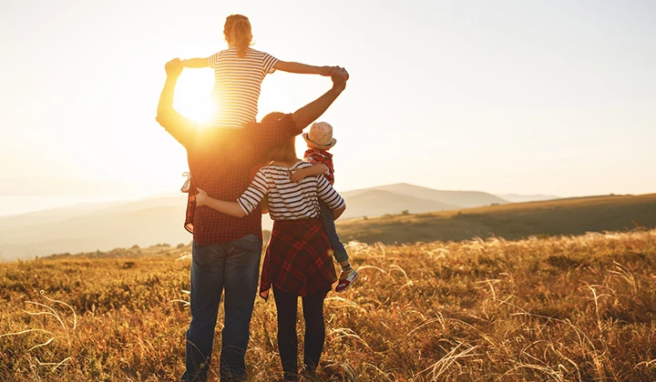 Familie in der Sonne Vitamin-D-Dosierung